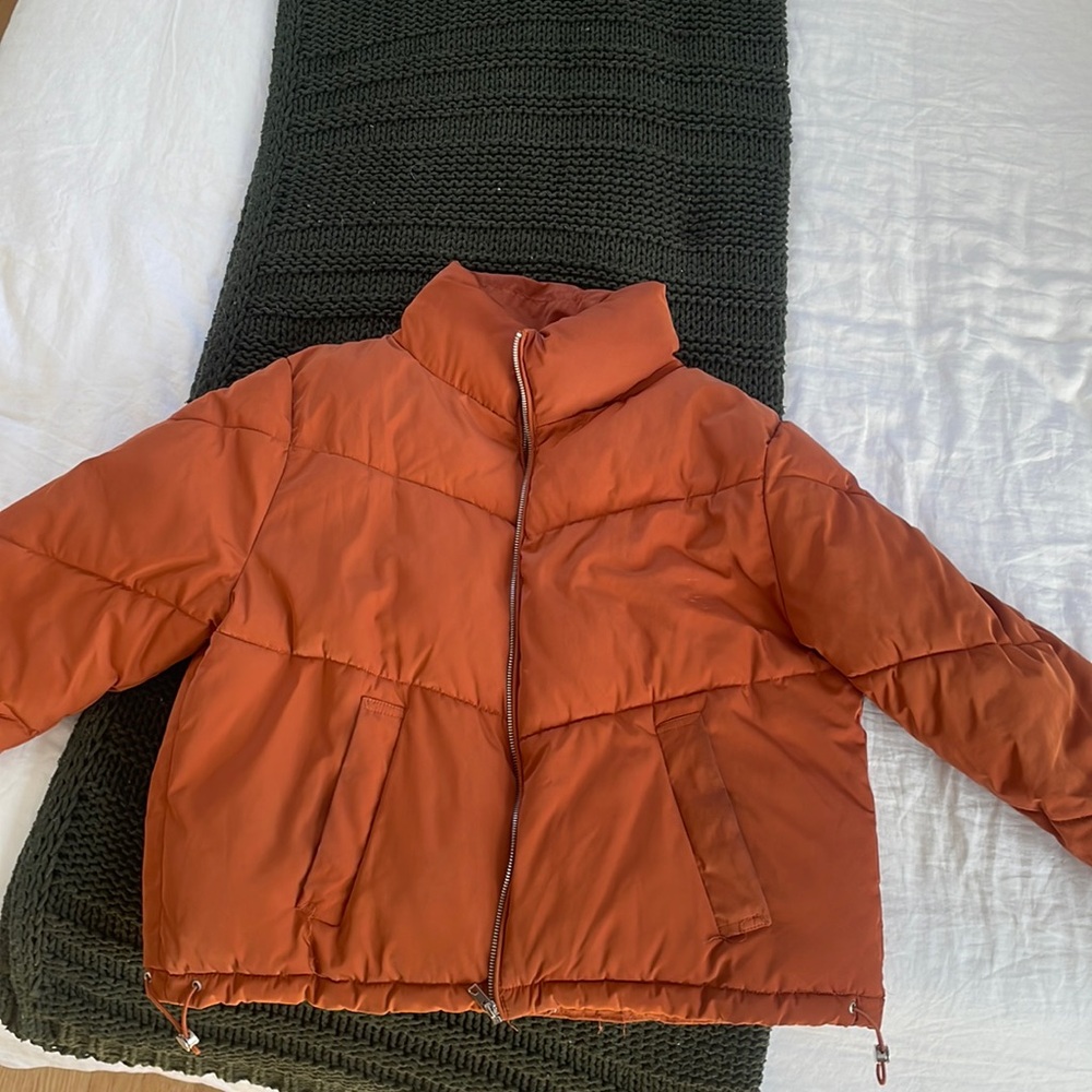 Orange puffer jacket